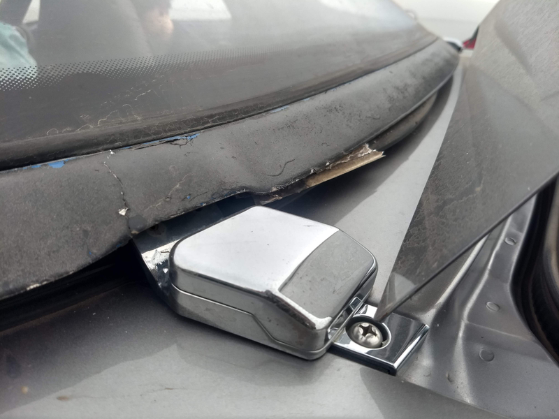The hardtop mounts tore right out of the material.